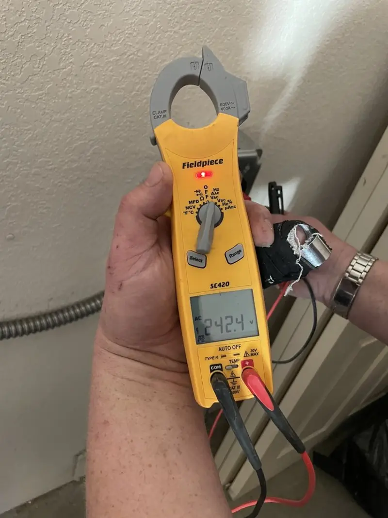 Voltage testing with clamp meter during Circuit Breaker Repair in Streetsboro